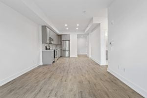 brown wooden parquet floor and white wall